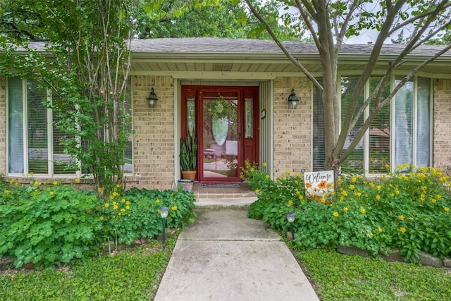 425 Headlee St, Denton, TX 76201 - property entrance with brick siding and a shingled roof