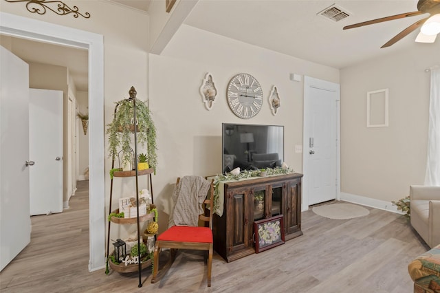 211 S Wickham St, Alvord, TX 76225 - living room with ceiling fan, wood finished floors, and baseboards