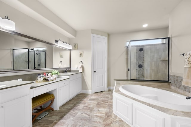 215 Dominion Dr, Wylie, TX 75098 - bathroom featuring double vanity, a stall shower, a garden tub, and recessed lighting