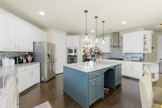 215 Dominion Dr, Wylie, TX 75098 - kitchen with wall chimney exhaust hood, stainless steel appliances, white cabinetry, tasteful backsplash, and open shelves