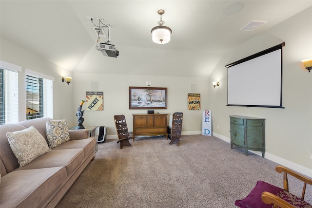 215 Dominion Dr, Wylie, TX 75098 - carpeted home theater featuring vaulted ceiling and baseboards