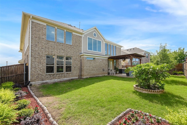 215 Dominion Dr, Wylie, TX 75098 - rear view of house with brick siding, a patio area, and ceiling fan