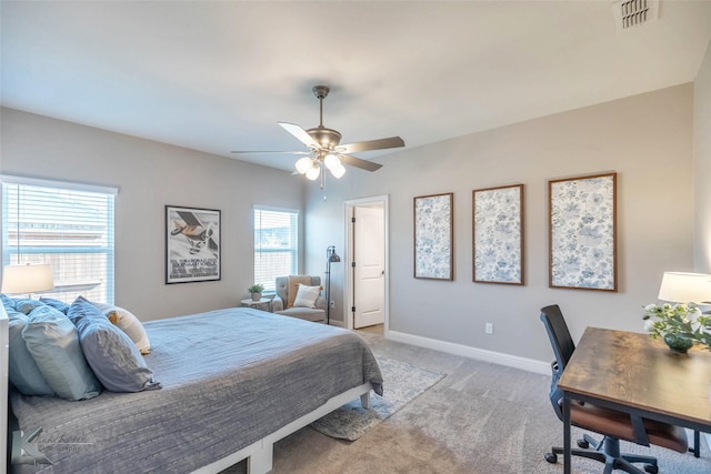 6709 Tradition Dr, Abilene, TX 79606 - bedroom featuring light colored carpet, an office area, baseboards, and ceiling fan