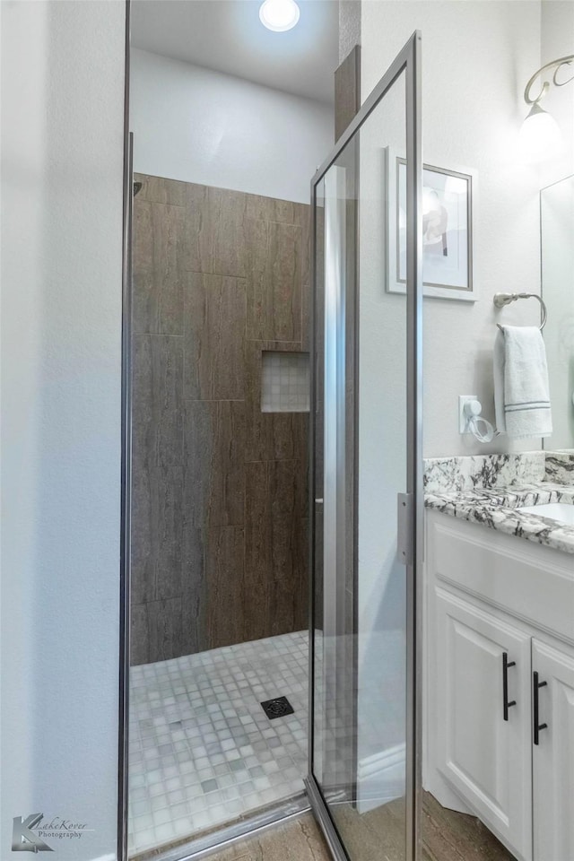 6709 Tradition Dr, Abilene, TX 79606 - bathroom with a shower stall and vanity