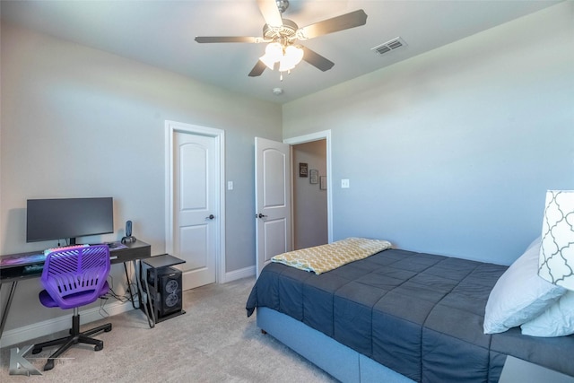 6709 Tradition Dr, Abilene, TX 79606 - bedroom with carpet floors, an office area, baseboards, and a ceiling fan
