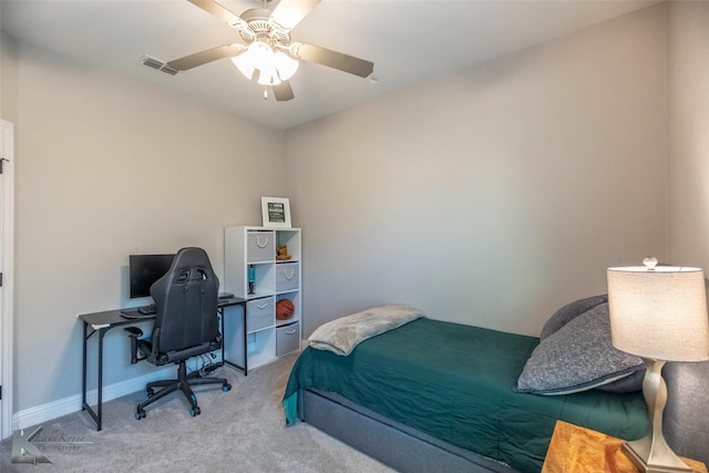 6709 Tradition Dr, Abilene, TX 79606 - bedroom with carpet flooring, ceiling fan, a desk, and baseboards