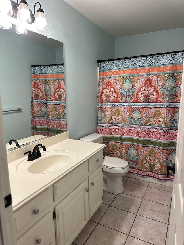804 Austin Acre, Sulphur Springs, TX 75482 - full bath featuring toilet, tile patterned flooring, a chandelier, vanity, and a shower with curtain