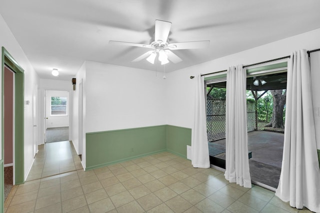 510 Allen Ave, Duncanville, TX 75137 - empty room with ceiling fan, light tile patterned floors, and baseboards