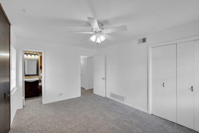 510 Allen Ave, Duncanville, TX 75137 - unfurnished bedroom with carpet flooring, a closet, baseboards, ensuite bath, and a ceiling fan
