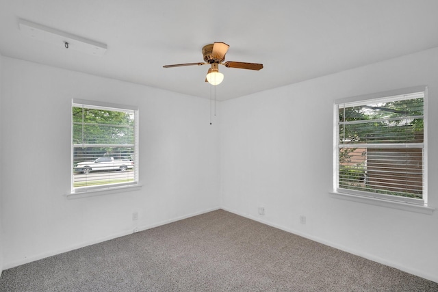 510 Allen Ave, Duncanville, TX 75137 - carpeted empty room featuring healthy amount of natural light, a ceiling fan, and baseboards