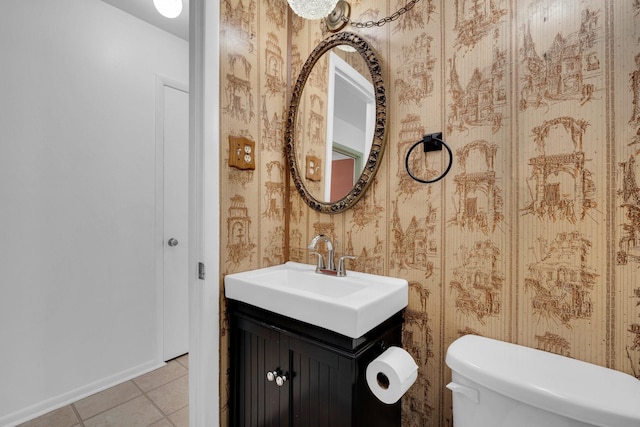 510 Allen Ave, Duncanville, TX 75137 - bathroom with wallpapered walls, tile patterned floors, toilet, vanity, and baseboards
