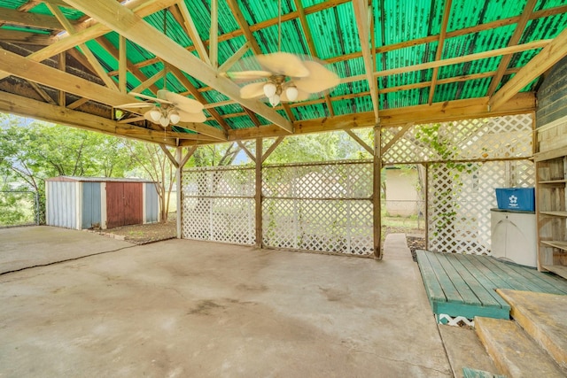 510 Allen Ave, Duncanville, TX 75137 - view of patio with a ceiling fan, a shed, an outdoor structure, fence, and a gazebo