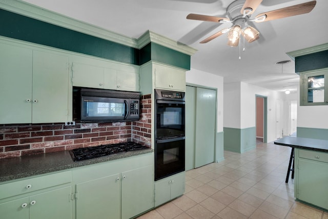 510 Allen Ave, Duncanville, TX 75137 - kitchen with black appliances, dark countertops, a ceiling fan, light tile patterned floors, and tasteful backsplash