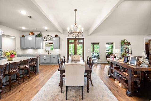 422 Sundance, Corsicana, TX 75109 - dining room with a chandelier, light wood-style floors, recessed lighting, and beamed ceiling
