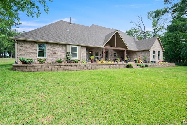 422 Sundance, Corsicana, TX 75109 - view of front of house with brick siding, a front lawn, and a shingled roof