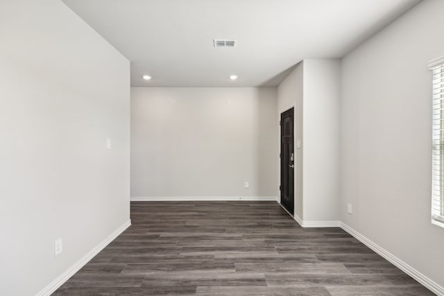418 Stagg St, Mckinney, TX 75069 - spare room with recessed lighting, dark wood finished floors, and baseboards