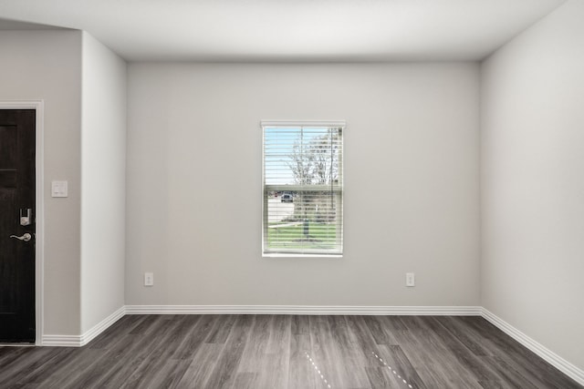 418 Stagg St, Mckinney, TX 75069 - spare room featuring dark wood finished floors and baseboards