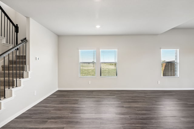418 Stagg St, Mckinney, TX 75069 - spare room featuring recessed lighting, stairway, dark wood-style floors, and baseboards
