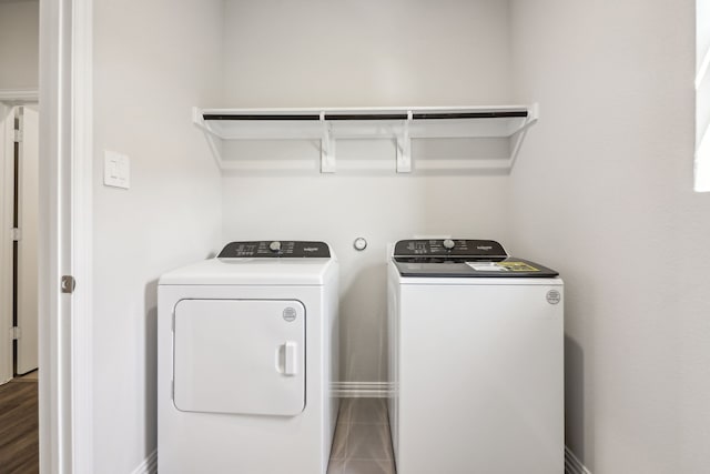 418 Stagg St, Mckinney, TX 75069 - laundry room featuring washing machine and dryer and baseboards