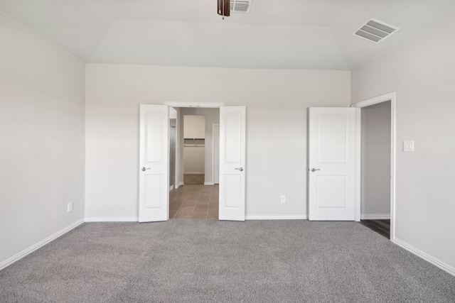 418 Stagg St, Mckinney, TX 75069 - unfurnished bedroom with carpet flooring, baseboards, and vaulted ceiling