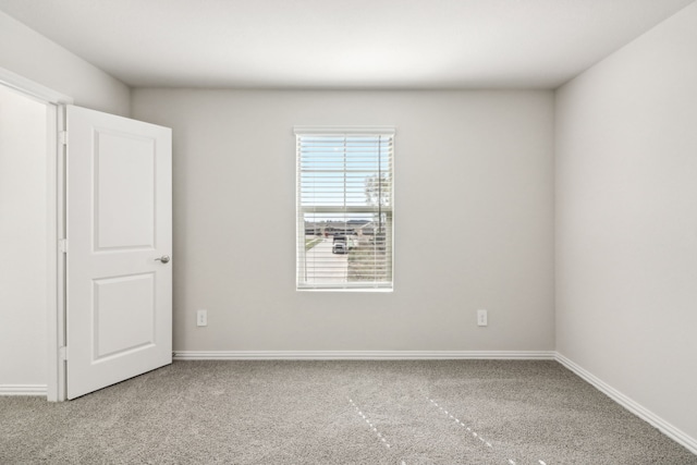 418 Stagg St, Mckinney, TX 75069 - carpeted spare room with baseboards