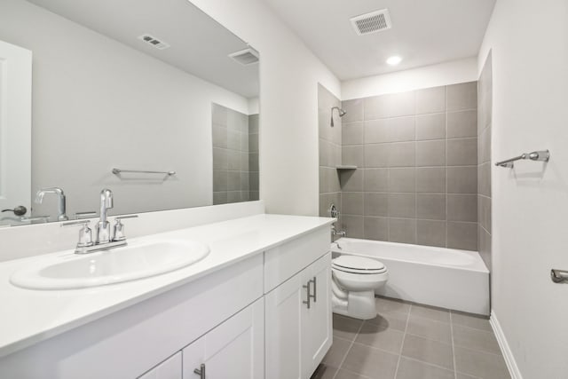 418 Stagg St, Mckinney, TX 75069 - bathroom with toilet, tile patterned floors, vanity, shower / bathtub combination, and baseboards