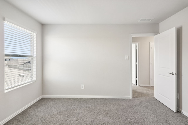 418 Stagg St, Mckinney, TX 75069 - spare room with carpet floors, plenty of natural light, and baseboards