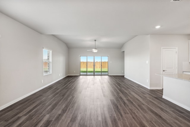 418 Stagg St, Mckinney, TX 75069 - unfurnished living room with dark wood-style flooring, baseboards, a ceiling fan, lofted ceiling, and recessed lighting