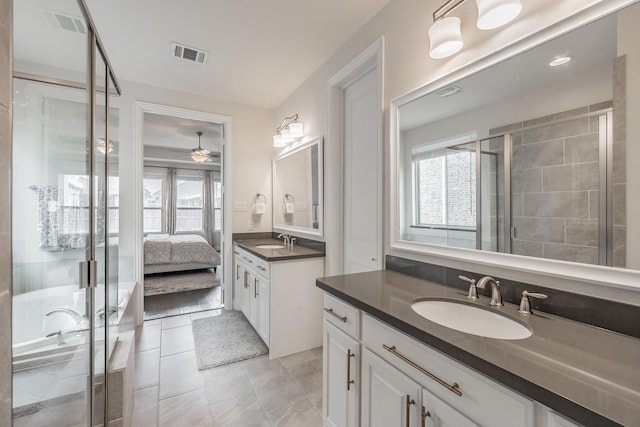 3723 Birch Wood Ct, Northlake, TX 76226 - full bath featuring a stall shower, a ceiling fan, two vanities, tile patterned floors, and ensuite bathroom