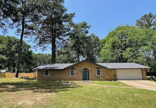 4054 Lakeshore Dr, Lone Star, TX 75668 - ranch-style home with a garage, concrete driveway, and brick siding