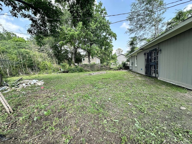 view of yard with fence