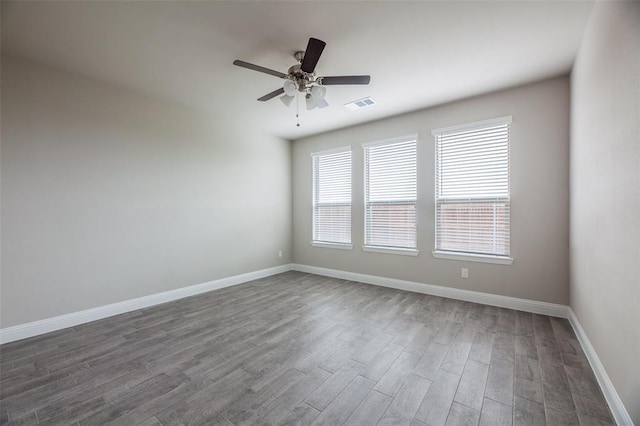 1683 Timpson Dr, Forney, TX 75126 - spare room with wood finished floors, baseboards, and ceiling fan