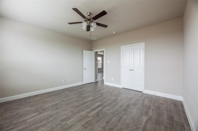 1683 Timpson Dr, Forney, TX 75126 - unfurnished bedroom featuring wood finished floors, baseboards, a closet, and a ceiling fan