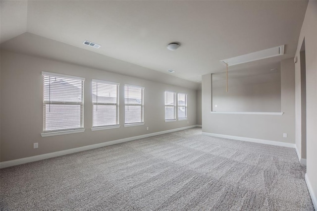 1683 Timpson Dr, Forney, TX 75126 - unfurnished room with attic access, carpet floors, baseboards, and vaulted ceiling