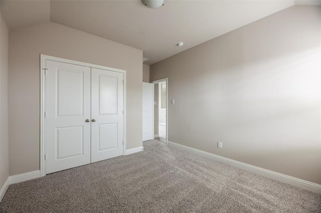 1683 Timpson Dr, Forney, TX 75126 - unfurnished bedroom with carpet floors, baseboards, a closet, and lofted ceiling
