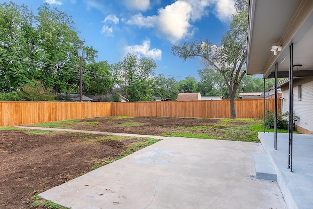 2103 S High St, Brady, TX 76825 - view of yard featuring a patio and fence