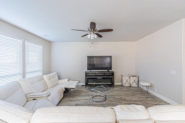 3001 Spring Ct, Midlothian, TX 76065 - living area with ceiling fan, wood finished floors, and baseboards