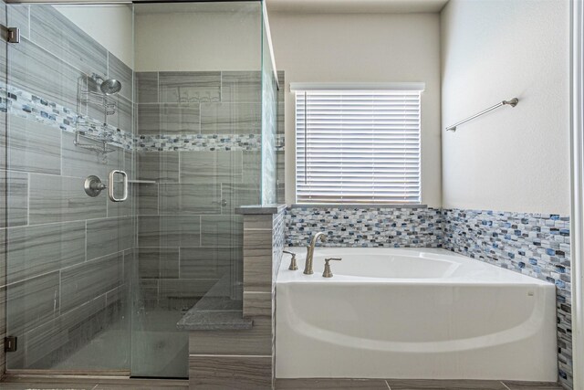 3001 Spring Ct, Midlothian, TX 76065 - bathroom with a garden tub and a stall shower