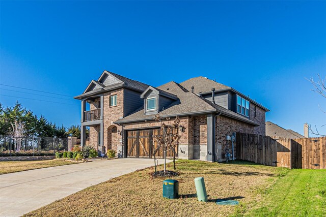 3001 Spring Ct, Midlothian, TX 76065 - traditional-style home with brick siding, concrete driveway, a shingled roof, and a balcony