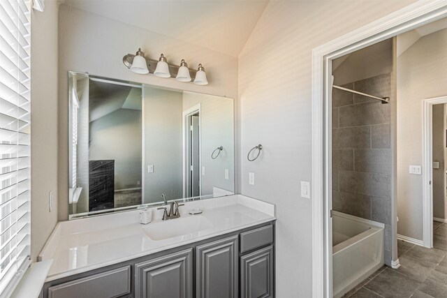 3001 Spring Ct, Midlothian, TX 76065 - bathroom featuring tile patterned flooring, vanity,  shower combination, and baseboards