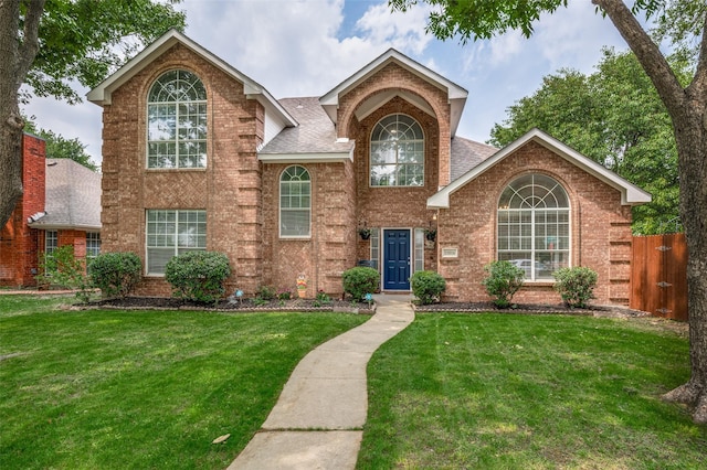 11016 Huntington Rd, Frisco, TX 75035 - traditional-style home featuring brick siding and a shingled roof