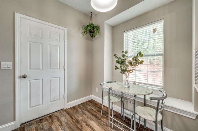11016 Huntington Rd, Frisco, TX 75035 - dining room with dark wood-style floors and baseboards