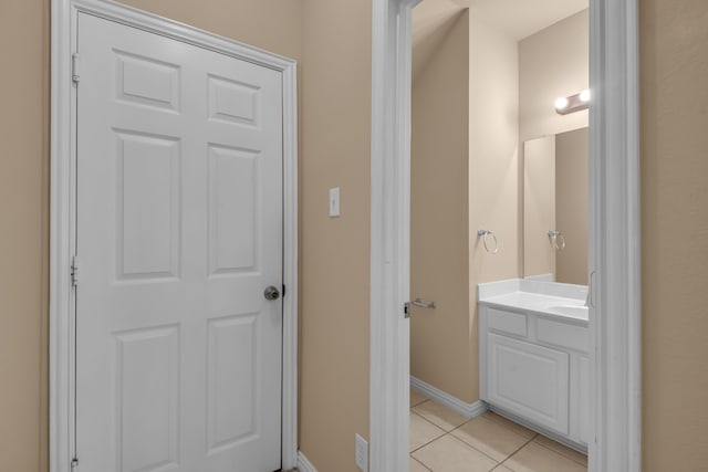 10317 Colfax Dr, Mckinney, TX 75072 - hall featuring light tile patterned floors and baseboards