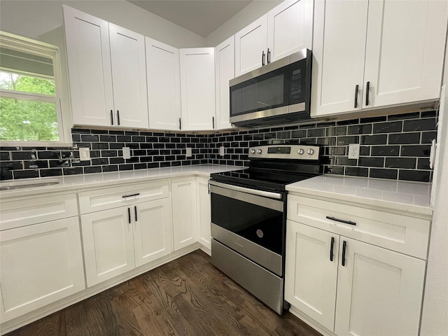 206 E Birch St, Campbell, TX 75422 - kitchen with stainless steel appliances, dark wood-type flooring, light countertops, white cabinets, and decorative backsplash