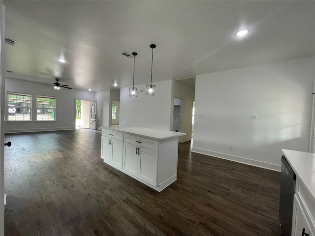 206 E Birch St, Campbell, TX 75422 - kitchen with open floor plan, dark wood-type flooring, baseboards, ceiling fan, and white cabinetry