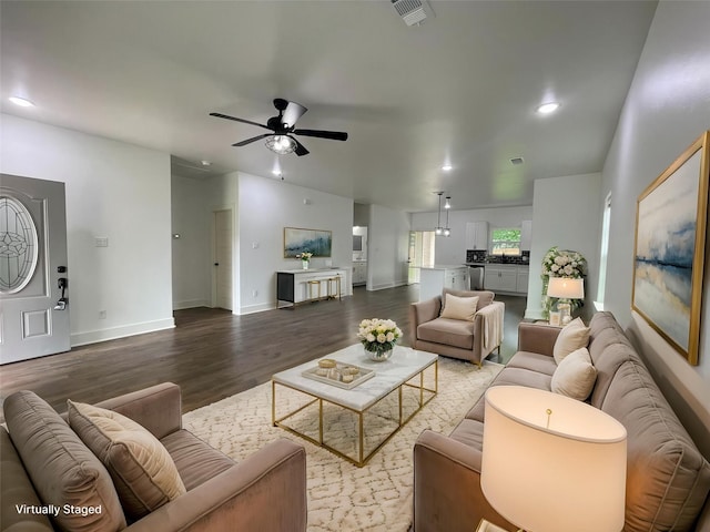 206 E Birch St, Campbell, TX 75422 - living area featuring ceiling fan, wood finished floors, baseboards, and recessed lighting