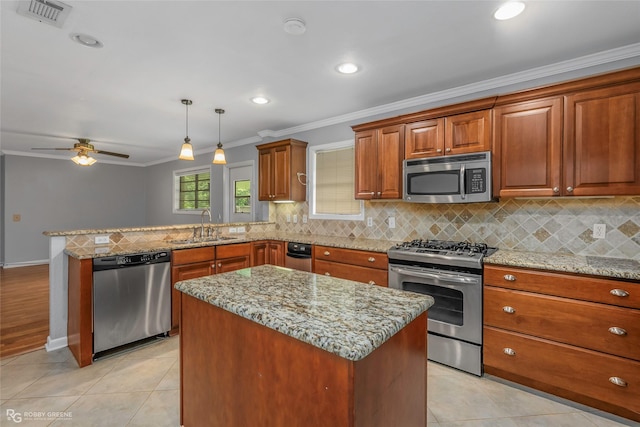 704 Taylor Bend St, Haughton, LA 71037 - kitchen featuring appliances with stainless steel finishes, a peninsula, a sink, tasteful backsplash, and ornamental molding