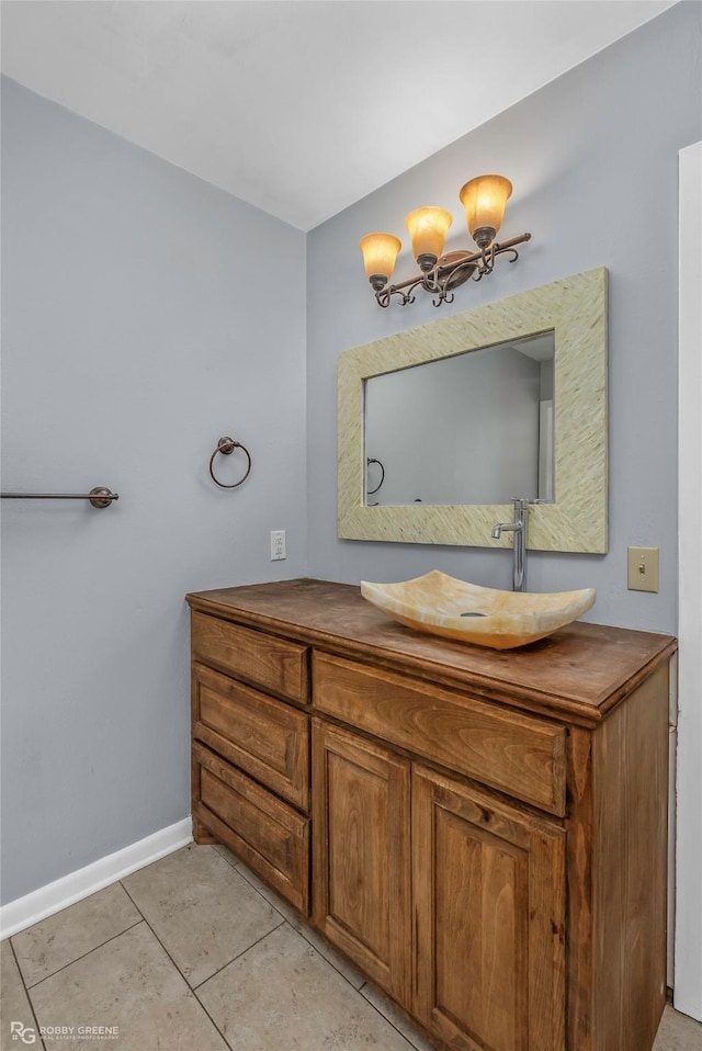 704 Taylor Bend St, Haughton, LA 71037 - bathroom featuring baseboards, tile patterned floors, a chandelier, and vanity