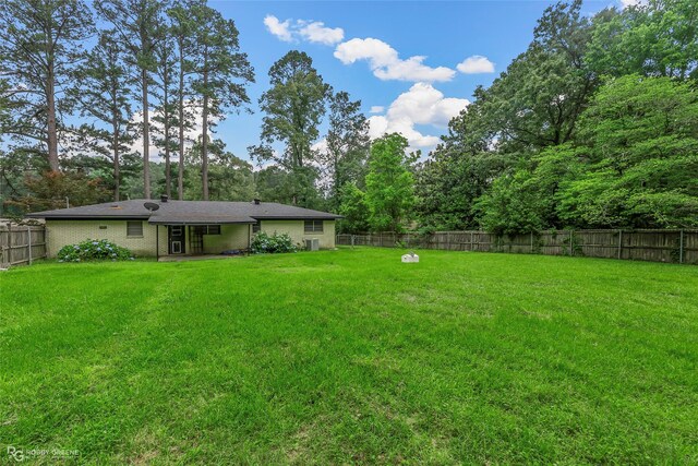 704 Taylor Bend St, Haughton, LA 71037 - view of yard with view of wooded area