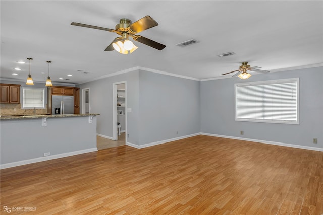 704 Taylor Bend St, Haughton, LA 71037 - unfurnished living room with a ceiling fan, light wood finished floors, ornamental molding, baseboards, and recessed lighting